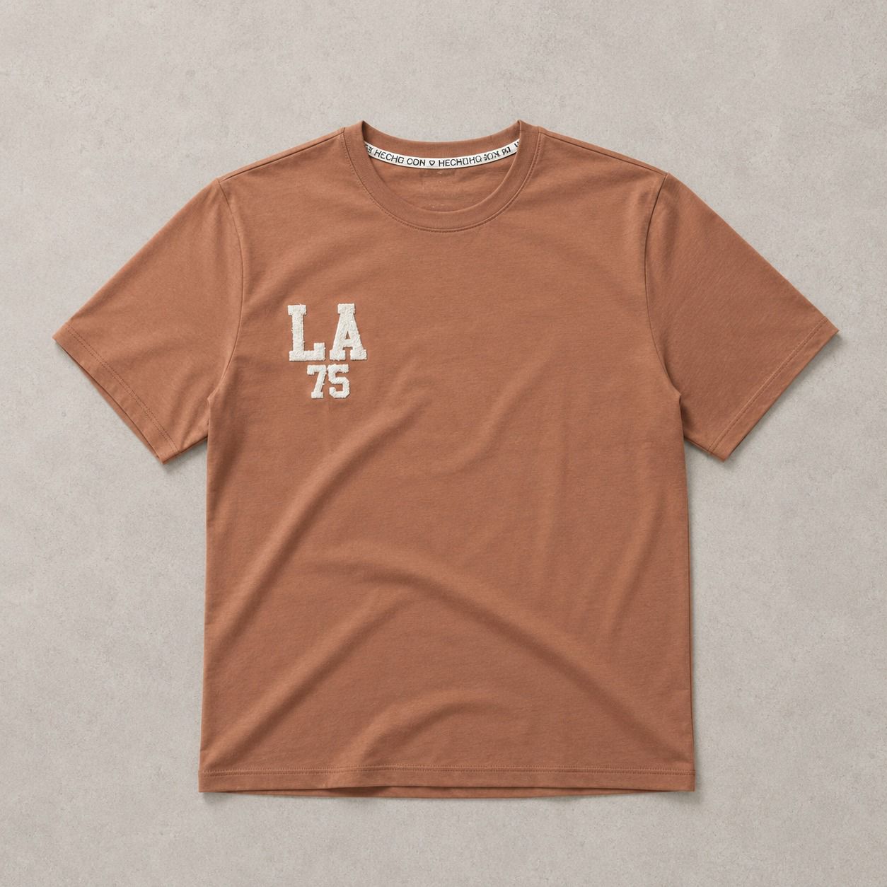 CAMISETA L.A BEIGE